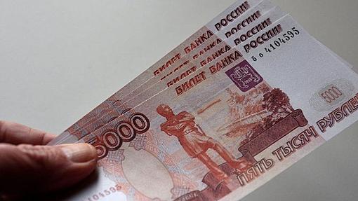 Fitch Ratings warns of 'imminent' Russian bond breach-_123607289_currency.jpg