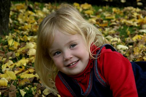 Toddler in autumn leaves-carmen20.jpg