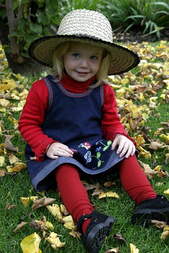 Toddler in autumn leaves-carmen14.jpg