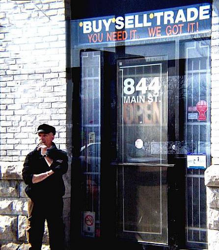 Man in front of Pawnshop-pawnshopmansm.jpg