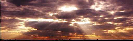 Sun shining through clouds-crop.jpg