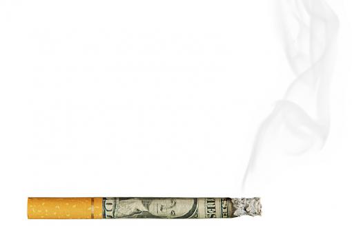 $ cost of smoking concept-cigarette2.jpg