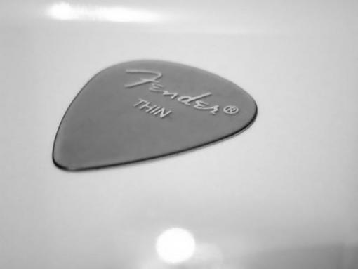 pencil and guitar pick-pick-small.jpg