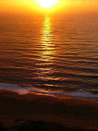 Sun rising over the sea-sunrise.jpg