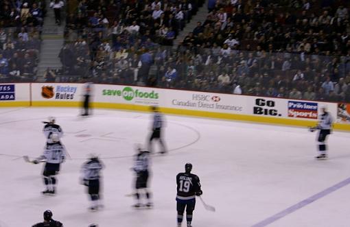 Hockey game with blurred figures.-naslund-cropped.jpg