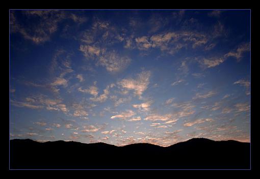 Can you find the face in the clouds?-clouds_sunrise.jpg