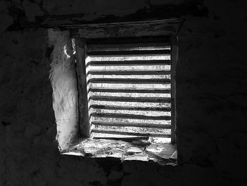 Weathered, Battered and Neglected-springhouse-window-b-w.jpg